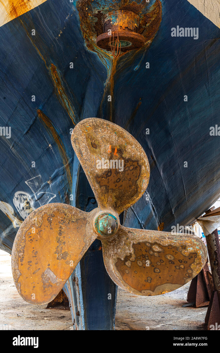 Old heavy ship`s propeller, screw  in the dry dock Stock Photo